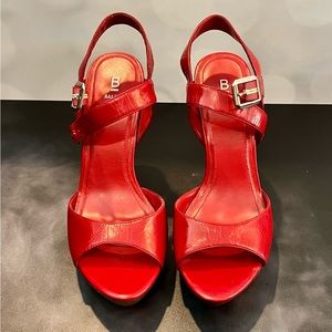 Red high heeled shoes - size 8